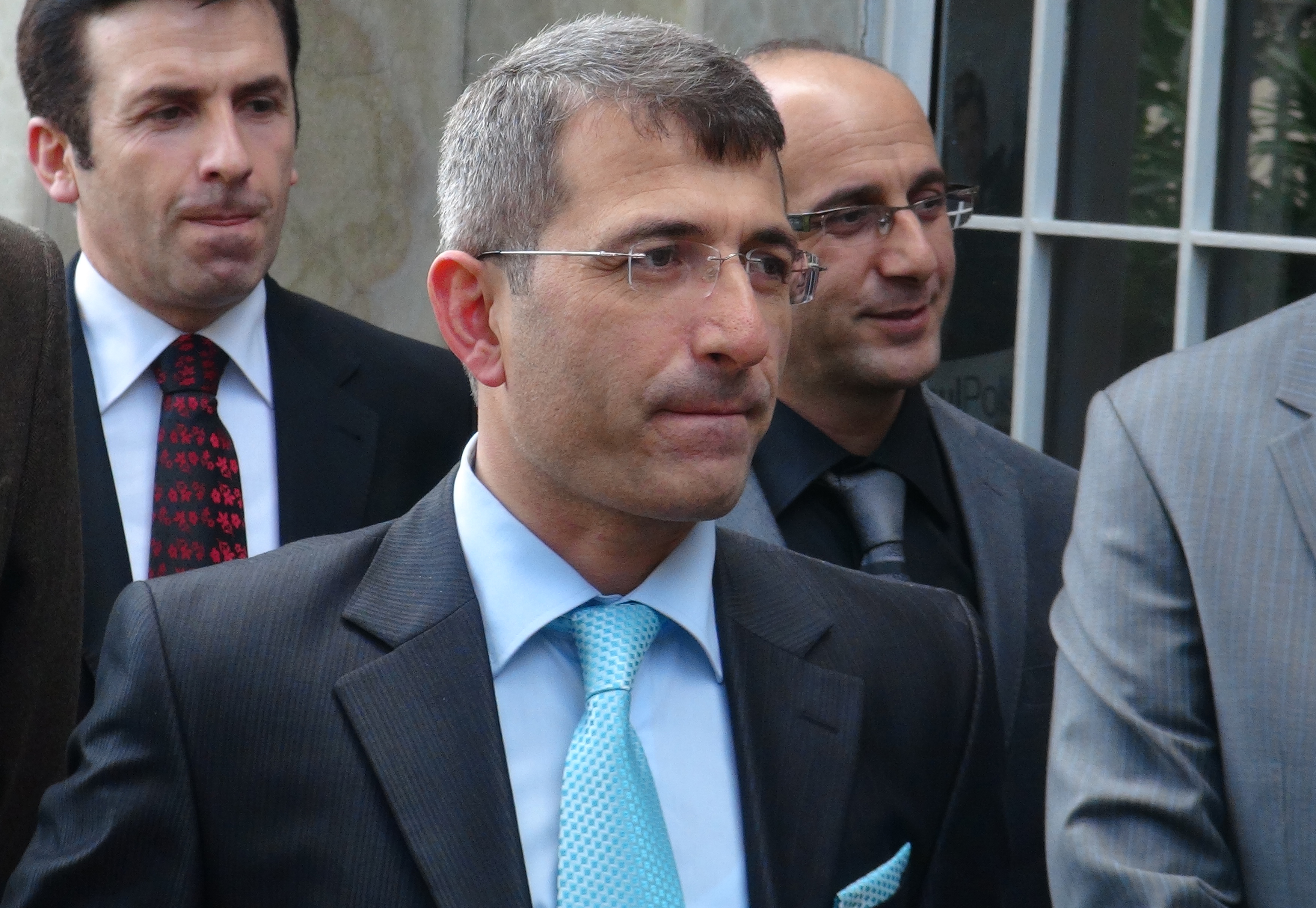 This photo taken on December 26, 2013, shows Turkish prosecutor Muammer Akkas as he walks out from a courthouse in Istanbul. The Turkish prosecutor said today he had been prevented from expanding a corruption investigation that has touched the heart of the government, alleging pressure on the judiciary. "All my colleagues and the public should be aware that I, as public prosecutor, have been prevented from launching an investigation," Muammer Akkas said in a statement. A high-level bribery and corruption investigation ensnaring former ministers and top businessmen has prompted a cabinet reshuffle by Prime Minister Recep Tayyip Erdogan, after three ministers stepped down in previous days. AFP PHOTO / CIHAN NEWS AGENCY / OSMAN ARSLAN ***TURKEY OUT*** (Photo credit should read Osman Arslan/AFP/Getty Images)